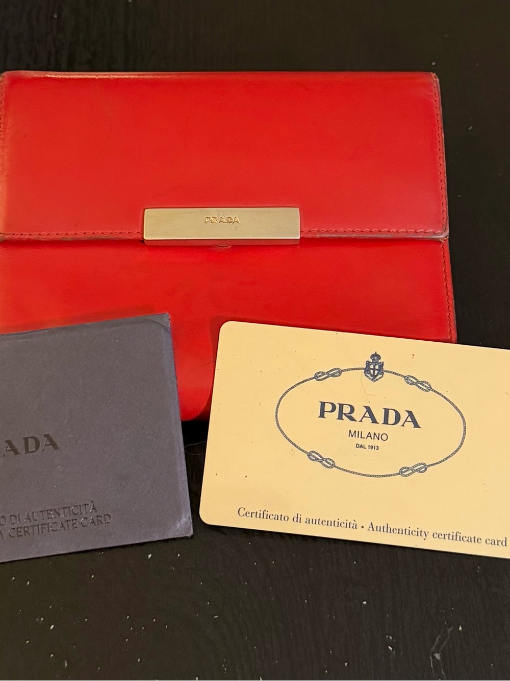 Prada Red Leather Card Holder with Gold Plaque